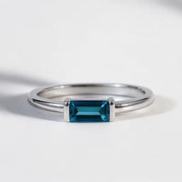 Silver ring with a london blue topaz gemstone 